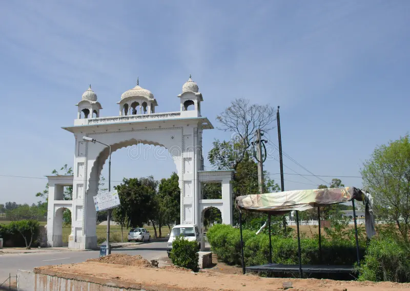 Traditional entrance to Sadda Pind Amritsar with colorful Punjabi architecture