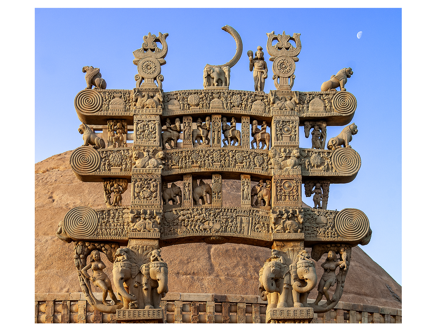 Carved torana gateway panels at Sanchi Stupa complex