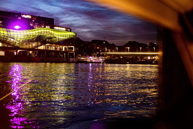 Night lights during Seine river cruise in Paris