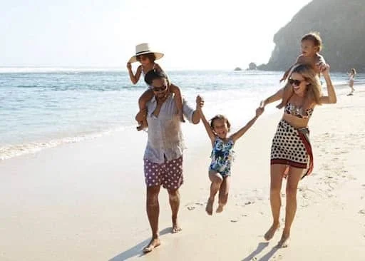 Family and group travelers at Seminyak Beach Bali