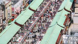 Senso-ji Temple grounds with traditional architecture and visitors
