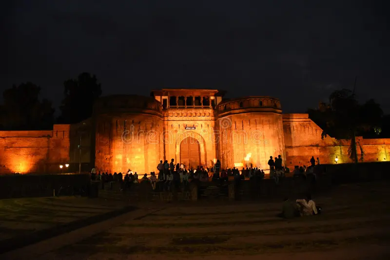 Evening view of Shaniwar Wada illuminated walls
