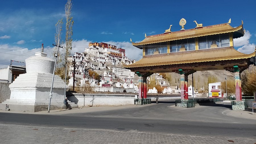 Monastery courtyard and prayer flags at Shey Palace complex