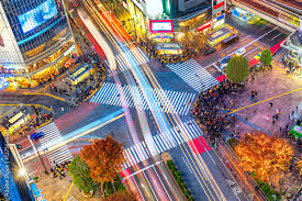 Aerial view of Shibuya Crossing scramble with thousands of pedestrians
