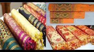 Assam silk mekhela chador displaying traditional golden Muga silk