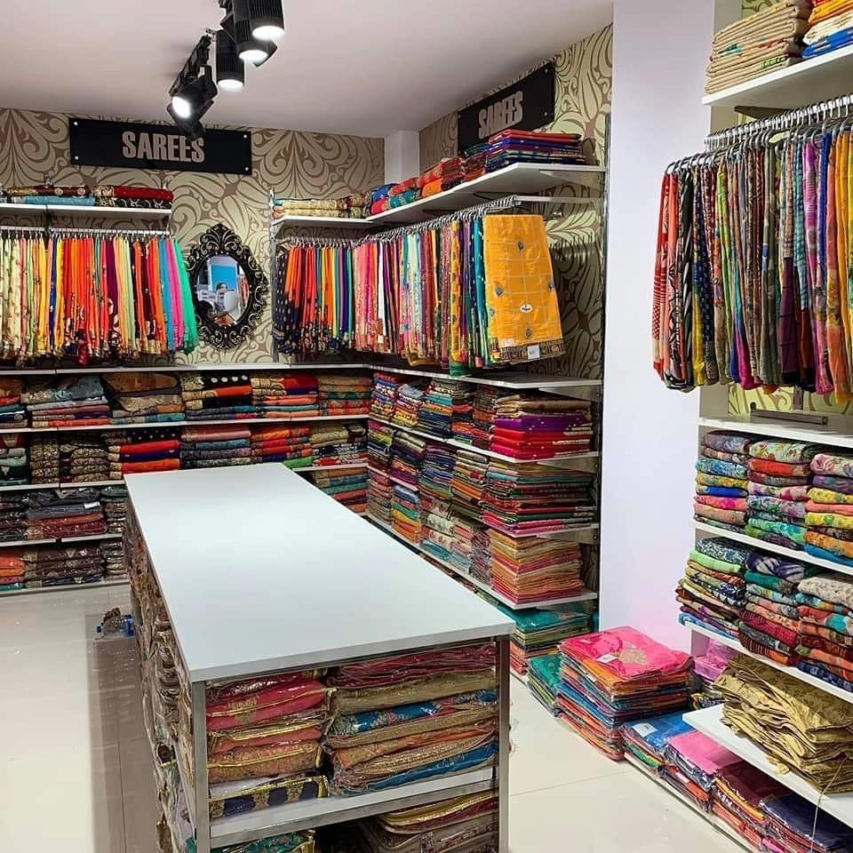 Beautiful saree collection displayed in Kanpur textile shop