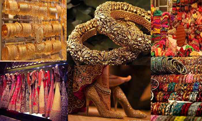 Wedding shopping display in Kanpur with bridal lehengas and traditional wear