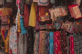Busy Aminabad market in Lucknow showing shops and street vendors