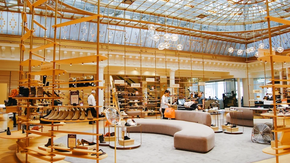 Interior of Galeries Lafayette department store showing iconic dome and shopping levels