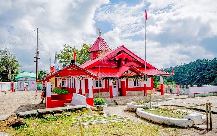 Temple exterior and prayer area at Nartiang