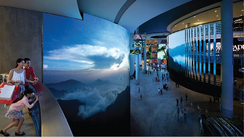 Interior shopping area of SkyAvenue Mall with luxury brands
