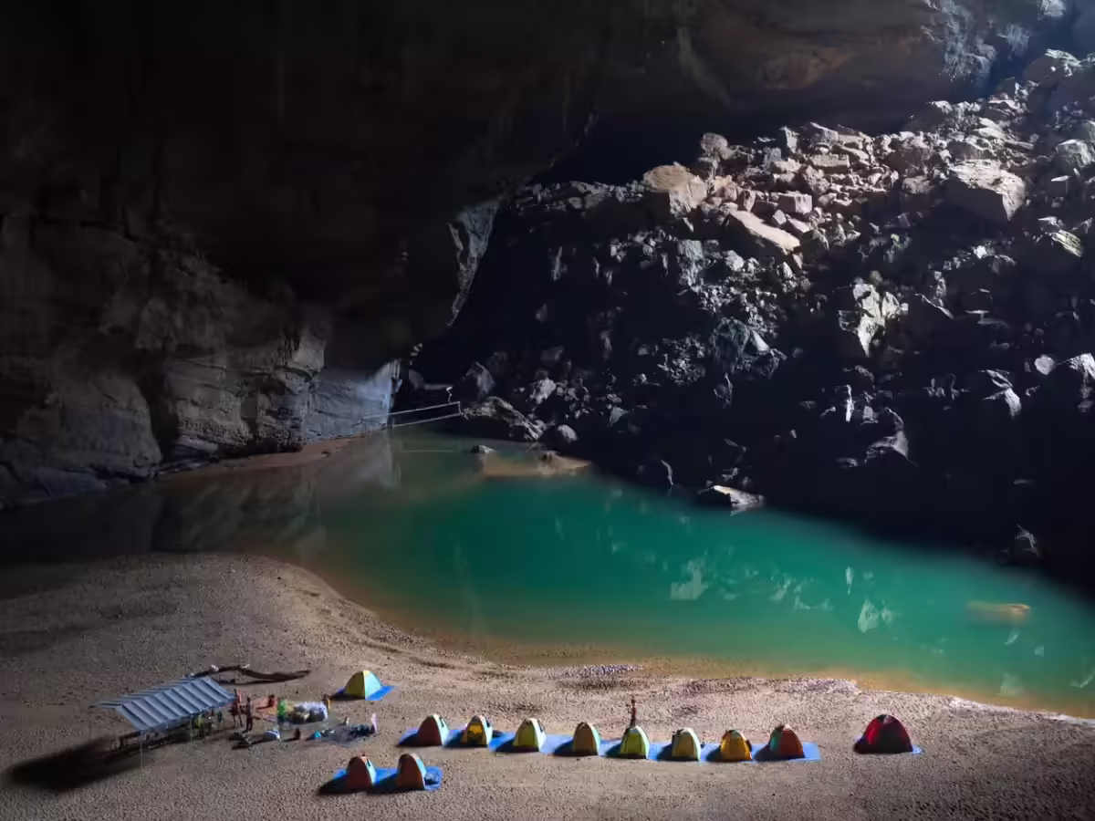 Sunlight through giant doline inside Son Doong Cave