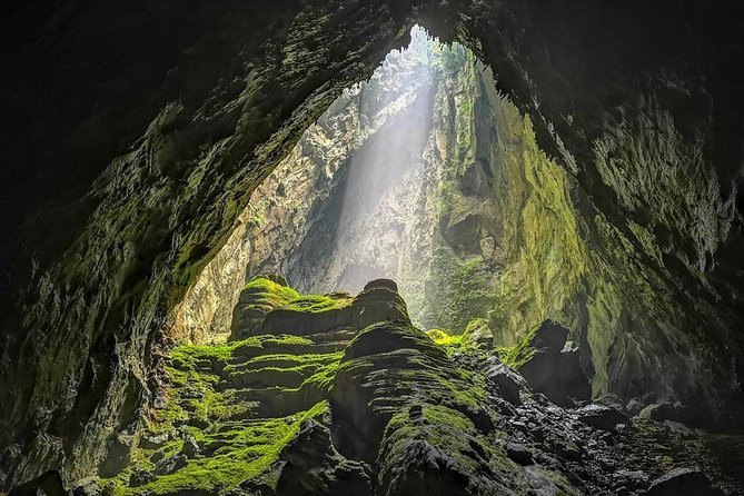 Guided trekking team moving through Son Doong Cave terrain