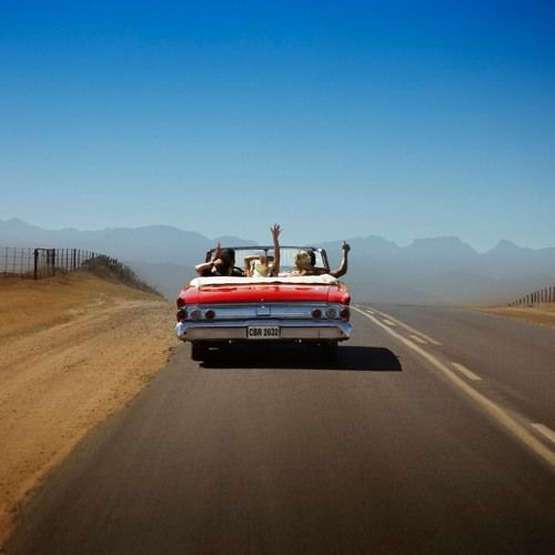 Road trip music playlist setup with headphones