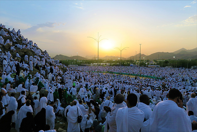 Pilgrimage travelers at sunrise in India