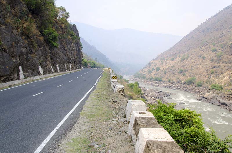Mountain road in Spiti Valley with snow walls in April