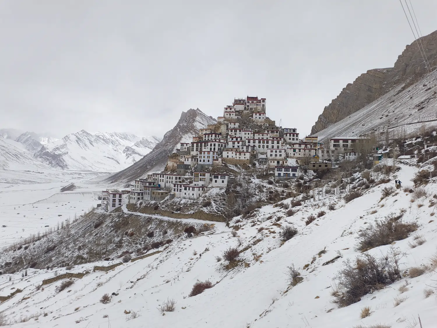 Trekkers crossing high mountain pass in Spiti Valley