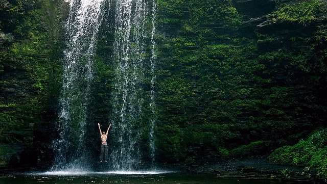 Forest-framed composition of Spread Eagle Falls in Shillong