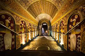 Temple interior corridor and ceremonial atmosphere in Kandy