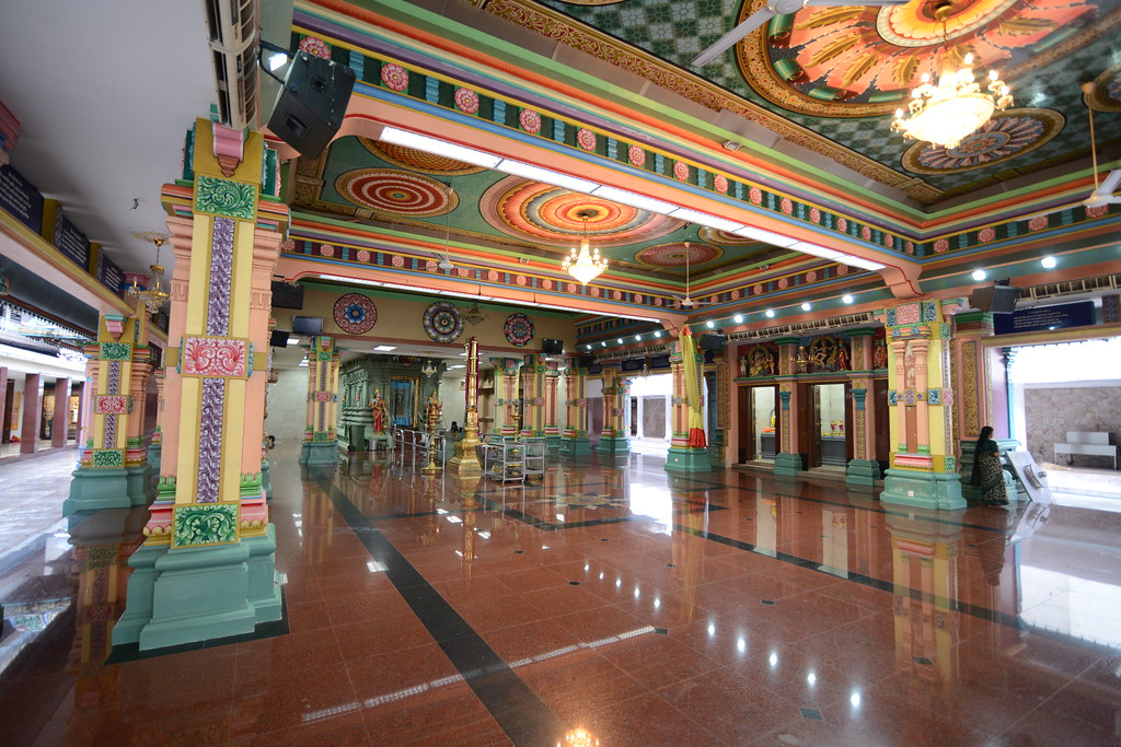Interior prayer area and devotional setting in Sri Mahamariamman Temple