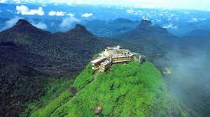 Sri Pada summit with sacred temple at sunrise