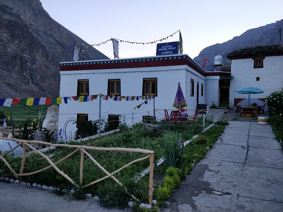 Cozy guesthouse setup and mountain hospitality in Tabo