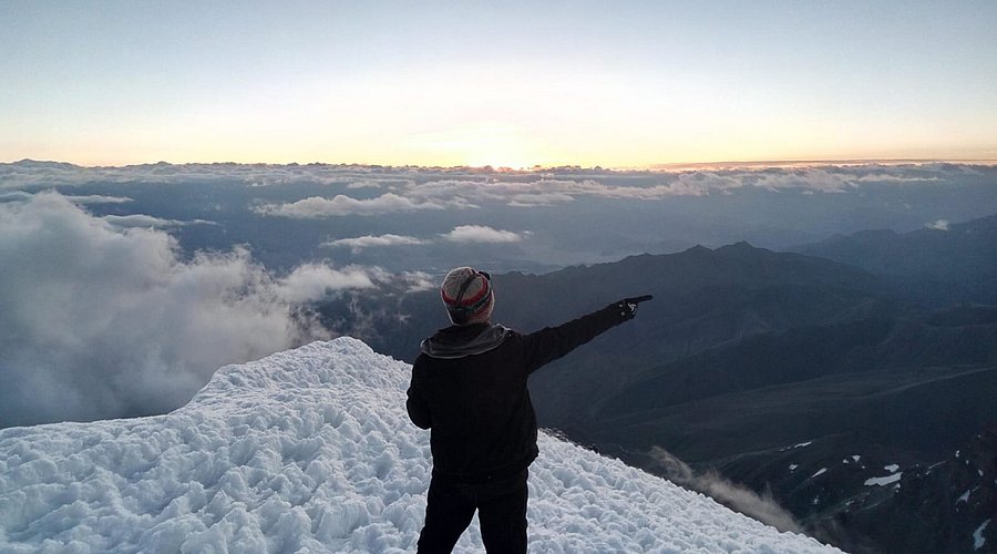 Stok Kangri summit view with prayer flags