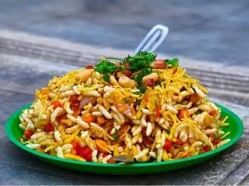 Bhel puri tossed with chutneys and sev in Mumbai