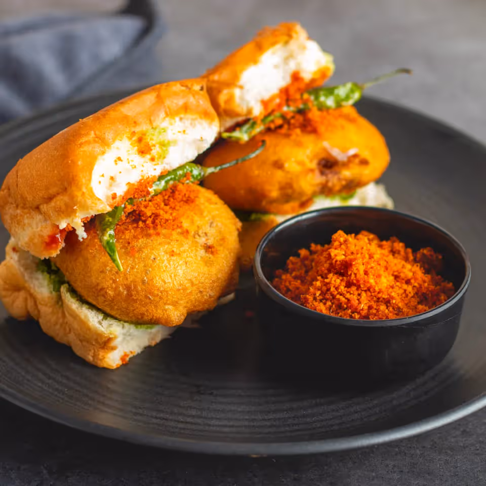 Fresh vada pav served at a busy Mumbai street stall