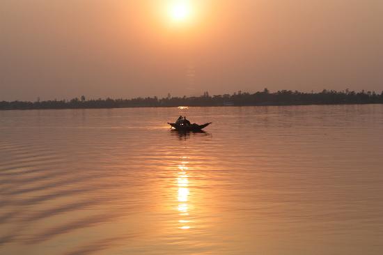 Sunset silhouette over Sundarbans river channel