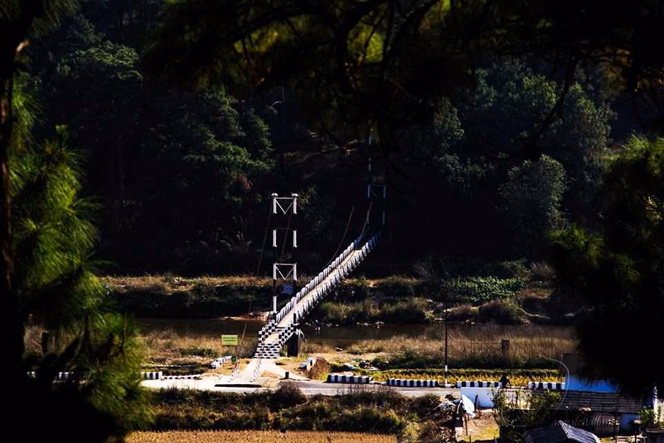 Syntu Ksiar Bridge spanning scenic river landscape in Meghalaya