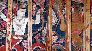 Ancient wall paintings inside Tabo Monastery depicting Buddhist deities and mandalas