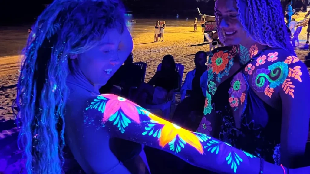 Neon body paint and beachwear at Full Moon Party Thailand