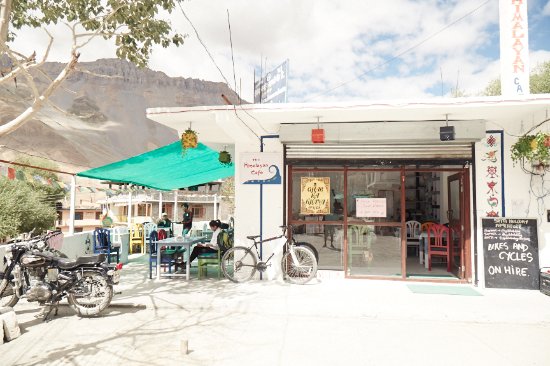 Cozy mountain-facing corner at cafe in Manali