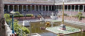 Pilgrims in the temple courtyard and ritual queue area at Thiruchendur