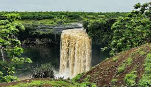 Scenic road and green valley views on the Tincha Falls route from Indore