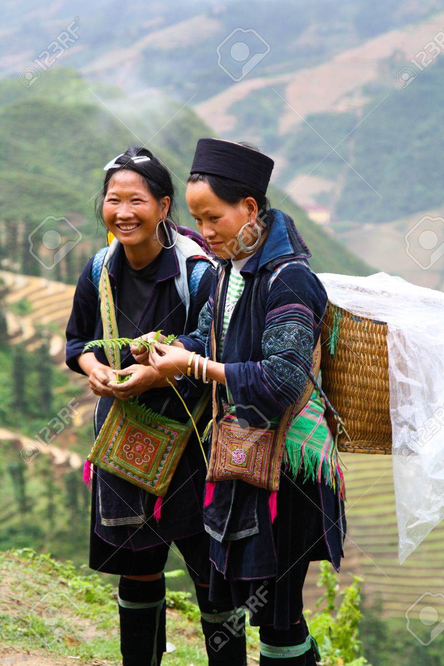 Black Hmong women in traditional dress