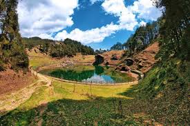 Serolsar Lake trek route through alpine forest near Jalori Pass