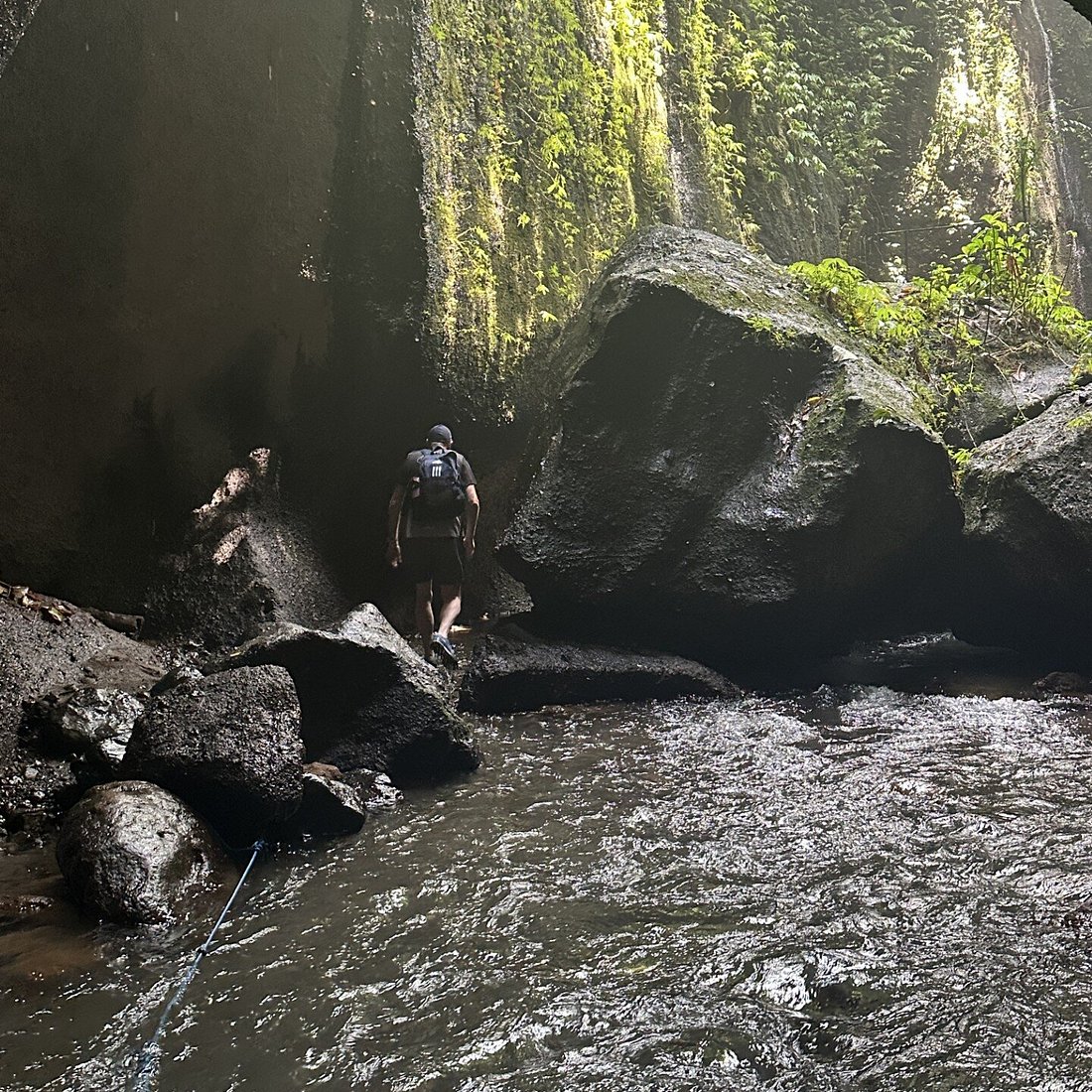 Canyon walls and waterfall chamber at Tukad Cepung