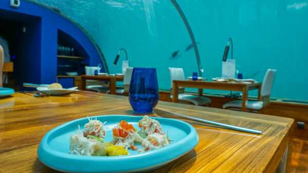 Fine dining multi-course presentation in Maldives undersea restaurant