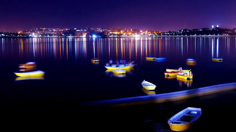 Evening reflections and city lights around Upper Lake Bhopal
