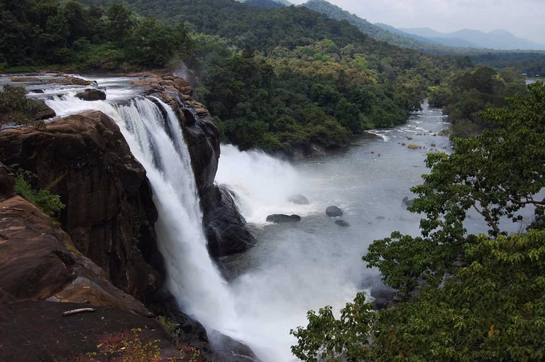 Misty cascading waterfall landscape near Vagamon in Kerala