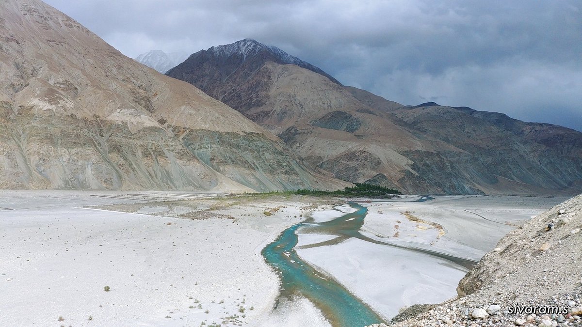 Wari La Pass with snow-capped peaks and winding road