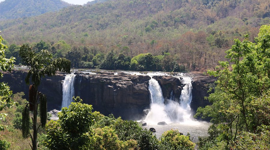 Vazhachal Waterfalls in dense forest landscape of Kerala