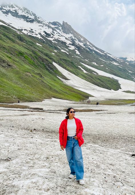 Tourist in summer clothing exploring Kashmir Mughal garden