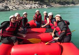 Rafting safety gear including life jackets and helmets